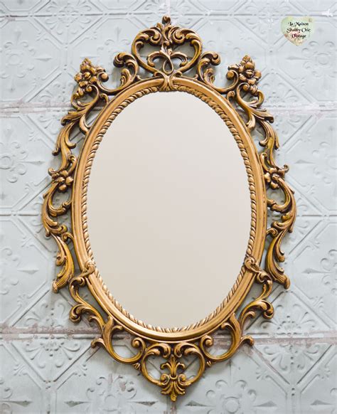 vintage ornate oval mirror.